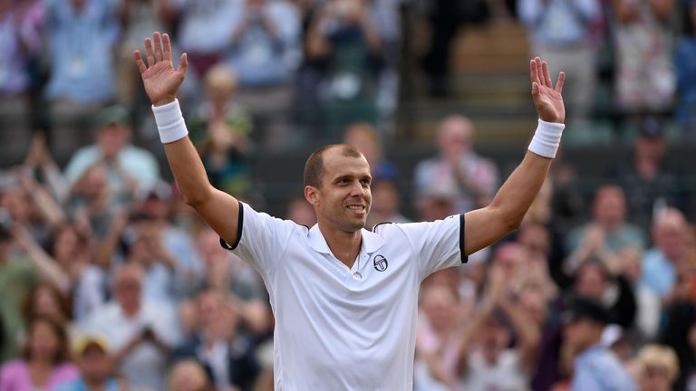 Gilles Muller ist der strahlende Sieger nach dem Marathon-Match gegen Rafael Nadal.