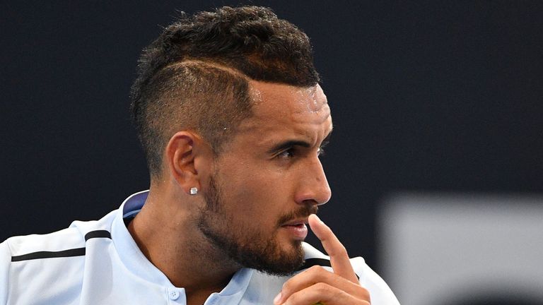 Nick Kyrgios of Australia prepares to serve against Grigor Dimitrov of Bulgaria during their men's singles semi-final match at the Brisbane International t