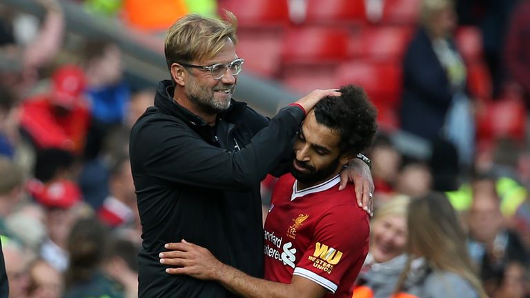 Jürgen Klopp (l.) und Mohamed Salah stehen mit dem FC Liverpool im Halbfinale der Champions League.