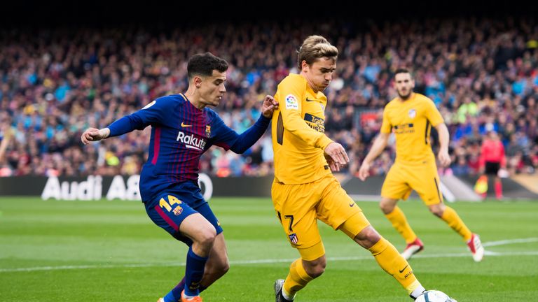 Antoine Griezmann (am Ball) könnte in der kommenden Saison Teamkollege von Philippe Coutinho (l.) beim FC Barcelona sein.