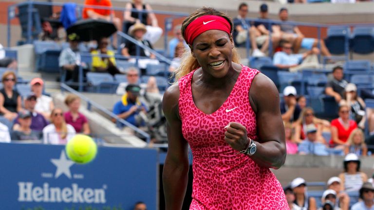Serena Williams of the U.S. celebrates winning a point against Kaia Kanepi of Estonia during their match in the Athur Ashe Stadium at the US Open tennis championship in New York, September 1, 2014.