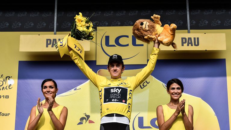 Geraint Thomas salutes the crowd after a trouble-free day on stage 18