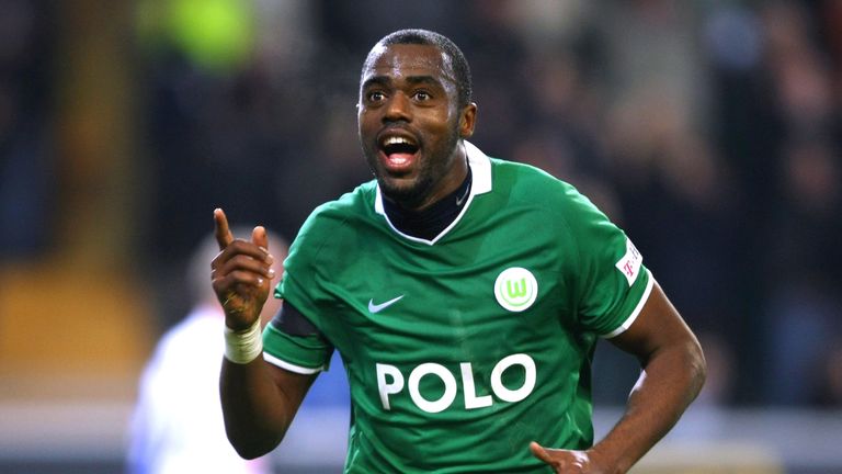 WOLFSBURG, GERMANY - MARCH 13:  Grafite of Wolfsburg celebrates after scoring his team's  fourth goal during the Bundesliga match between VfL Wolfsburg and FC Schalke 04 at the Volkswagen Arena on March 13, 2009 in Wolfsburg, Germany.  (Photo by Joern Pollex/Bongarts/Getty Images)