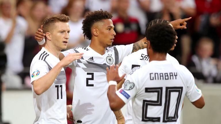 Germany's Marco Reus celebrates scoring with team-mates Thilo Kehrer, Leroy Sane and Serge Gnabry