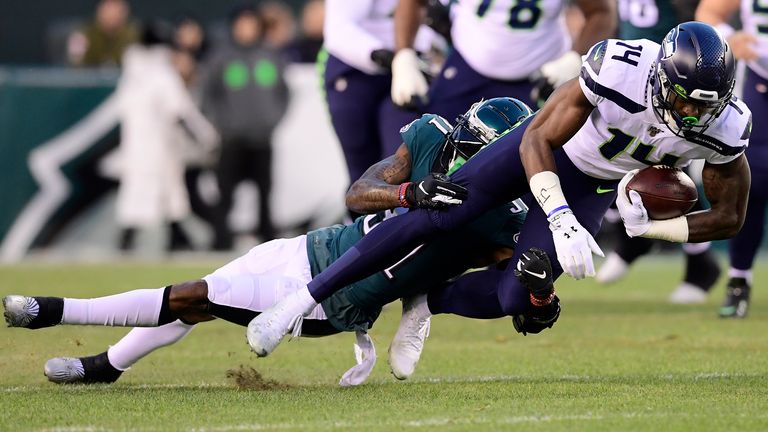 DK Metcalf (Nr. 14) führte die Seattle Seahawks mit einer starken Leistung in die nächste Runde der NFL-Playoffs.