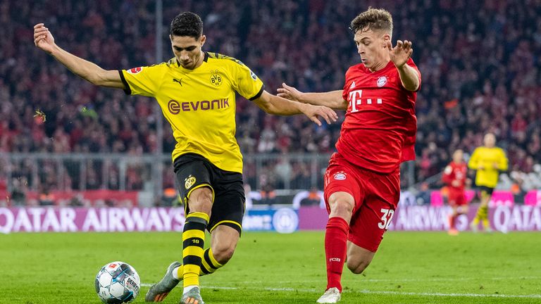 Könnten Gerüchten zufolge bald Teamkollegen sein: Joshua Kimmich (r.) vom FC Bayern München und Achraf Hakimi (l.) von Borussia Dortmund.