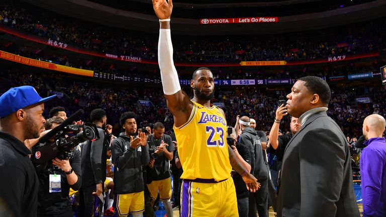 PHILADELPHIA, PA - JANUARY 25: LeBron James #23 of the Los Angeles Lakers thanks the crowd after passing Kobe Bryant for third on NBA's all-time scoring list on January 25, 2020 at the Wells Fargo Center in Philadelphia, Pennsylvania NOTE TO USER: User expressly acknowledges and agrees that, by downloading and/or using this Photograph, user is consenting to the terms and conditions of the Getty Images License Agreement. Mandatory Copyright Notice: Copyright 2020 NBAE (Photo by Jesse D. Garrabrant/NBAE via Getty Images)