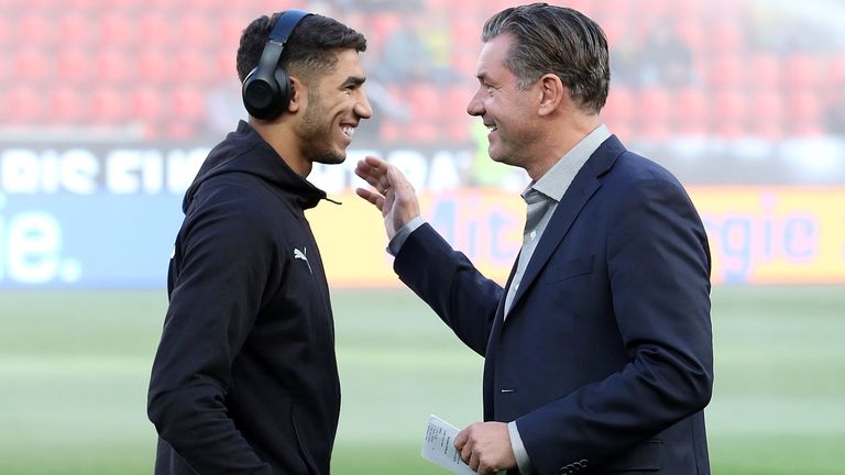 BVB-Sportdirektor Michael Zorc (r.) hat noch Hoffnung, dass Achraf Hakimi (l.) weiter in Dortmund bleibt.