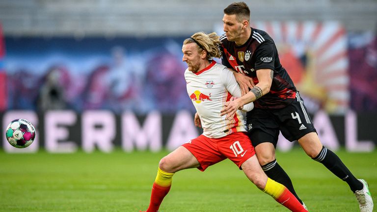 Emil Forsberg (l.) und Niklas Süle (r.) treffen am Samstag im Topspiel des 4. Bundesliga-Spieltags zwischen Leipzig und Bayern aufeinander. 