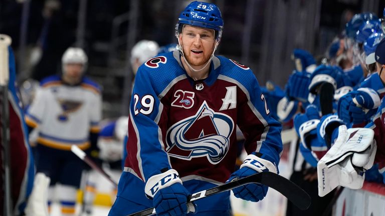 Colorado Avalanche center Nathan MacKinnon is congratulated as he passes the team box after scoring his second goal of night in the third period of Game 2 of an NHL hockey Stanley Cup first-round playoff series against the St. Louis Blues in Denver. (AP Photo/David Zalubowski, File)..................
