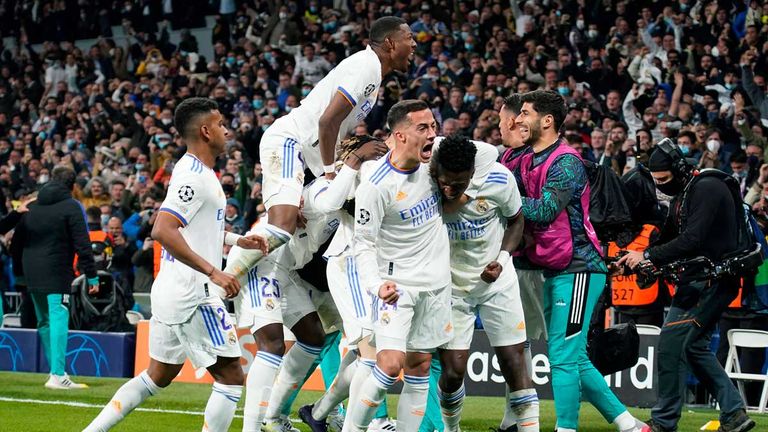Real Madrid celebrates qualifying for the Champions League semi-final against Chelsea.