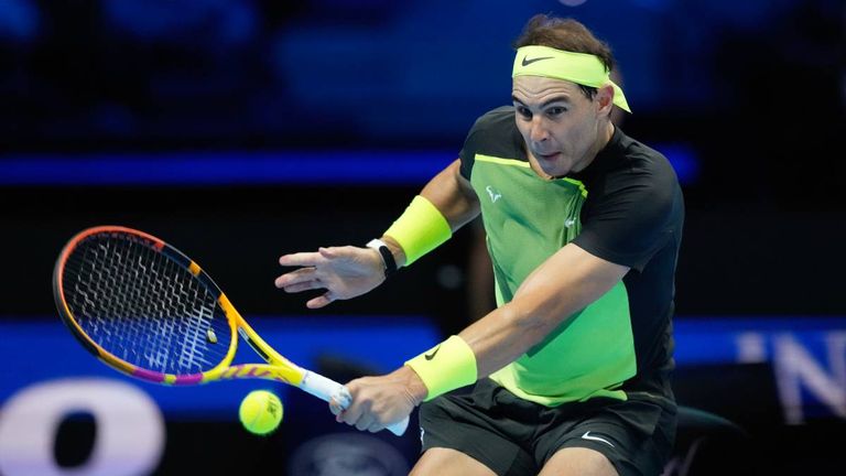 Spain&#39;s Rafael Nadal returns the ball to United States&#39; Taylor Fritz during their singles tennis match of the ATP World Tour Finals, at the Pala Alpitour in Turin, Italy, Sunday, Nov. 13, 2022. (AP Photo/Antonio Calanni)