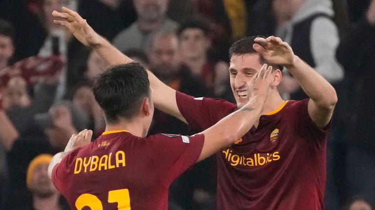 Roma&#39;s Marash Kumbulla, right, celebrates with Roma&#39;s Paulo Dybala after scoring his side&#39;s 2nd goal during the Europa League soccer match between Roma and Real Sociedad at Rome&#39;s Olympic stadium, Thursday, March 9, 2023. (AP Photo/Gregorio Borgia)