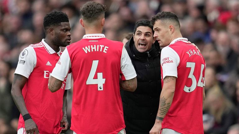 Arsenal's manager Mikel Arteta, second right, speaks to his players during the English Premier League soccer match between Arsenal and Leeds United at the Emirates Stadium in London, Saturday, April 1, 2023.(AP Photo/Kin Cheung)