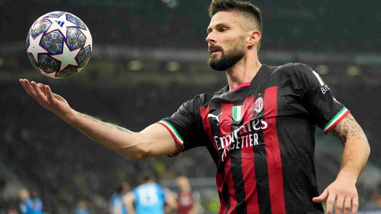 AC Milan&#39;s Olivier Giroud holds the ball during the Champions League quarterfinal, first leg, soccer match between AC Milan and Napoli, at the San Siro stadium in Milan , Italy, Wednesday, April 12, 2023. (AP Photo/Luca Bruno)
