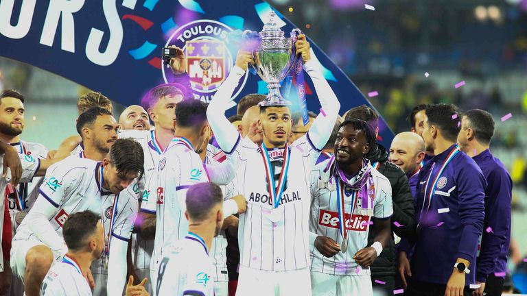 SAINT DENIS, FRANCE - APRIL 29: Toulouse FC players celebrate with the trophy after winning the French Cup final football match between FC Nantes and Toulouse FC at the Stade de France stadium, in Saint-Denis, on the outskirts of Paris, on April 29, 2023. Ibrahim Ezzat / Anadolu Agency
