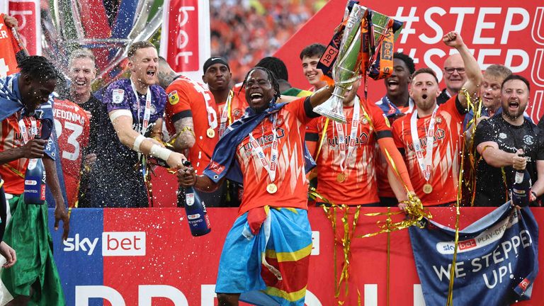 London, England, 27th May 2023. Pelly Mpanzu of Luton Town starts the celebration in gaining promotion to the Premier League during the Sky Bet Championship match at Wembley Stadium, London. Picture credit should read: David Klein