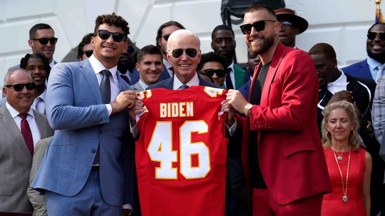 United States President Joe Biden is presented a jersey from Quarterback Patrick Mahomes and Tight End Travis Kelce as he welcomes the Kansas City Chiefs to celebrate their victory in Super Bowl LVII on the South Lawn of the White House in Washington on June 5, 2023. PUBLICATIONxNOTxINxUSA Copyright: xCNPx/xMediaPunchx