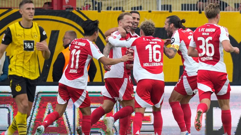 Berlin players celebrate after a goal during the Bundesliga soccer match between Union Berlin and Borussia Dortmund in Berlin, Germany, on Saturday, Oct. 5, 2024.(AP Photo/Ebrahim Noroozi)