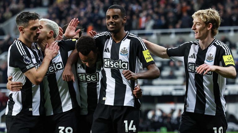 Newcastle players celebrate Alexander Isak's strike against Aston Villa