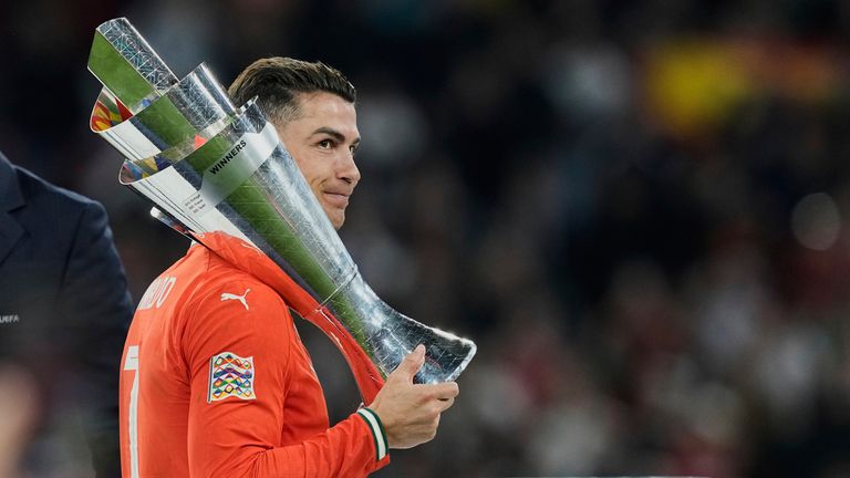 Cristiano Ronaldo holds the trophy after Portugal won the Nations League final