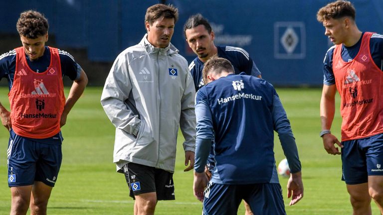 Merlin Polzin (m.) gastiert mit dem HSV in München.