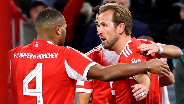 Harry Kane celebrates with his team-mates after giving Bayern Munich a first-half lead against Borussia Dortmund