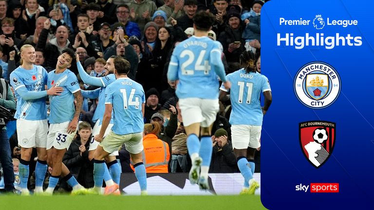 Nico O'Reilly  celebrates with his Man City team-mates after scoring their third goal against Bournemouth in their Premier League match