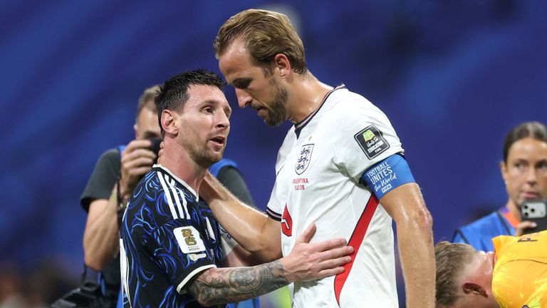 Lionel Messi is congratulated by Harry Kane at full time