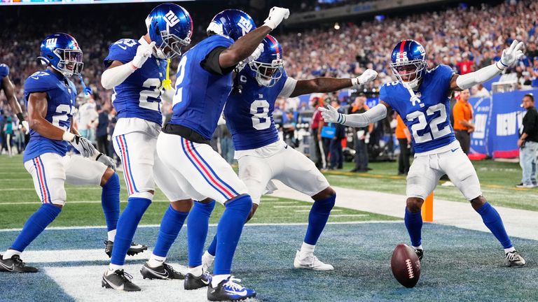 Die Giants-Spieler bejubeln den Sieg über die Cowboys. 