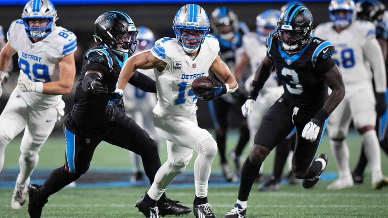 Amon-Ra St. Brown (m.) erzielt gegen die Panthers erstmals in dieser Saison keinen Touchdown.