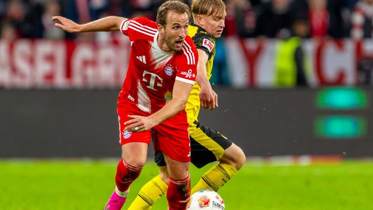 Harry Kane (l.) und Daniel Svensson treffen am Samstag im Klassiker zwischen dem FC Bayern und Borussia Dortmund aufeinander.